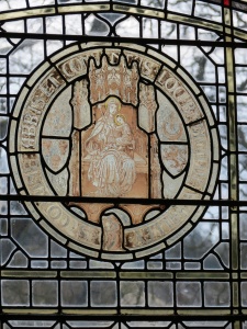 Stained glass on the south staircase, which was remodelled in the Victorian gothic style